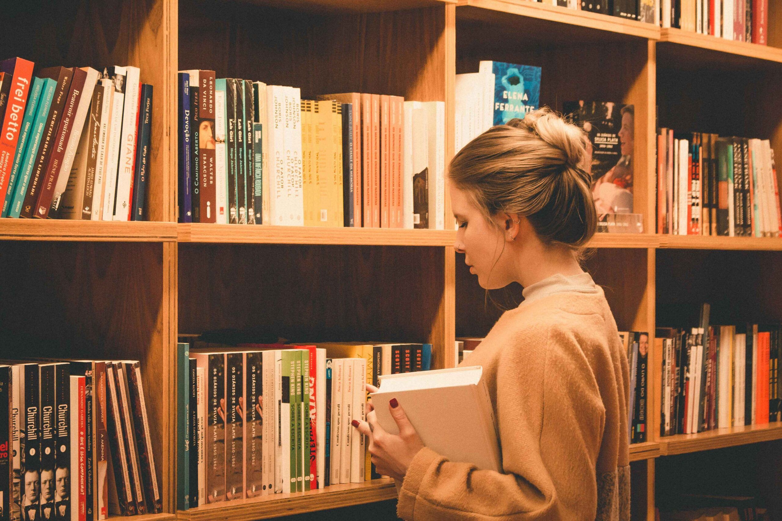 Books in the Library Shelves